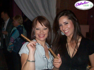 women enjoying cigars